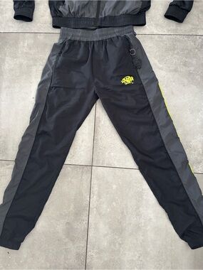Syna World Black & Gray Track Pants with Neon Yellow Logo